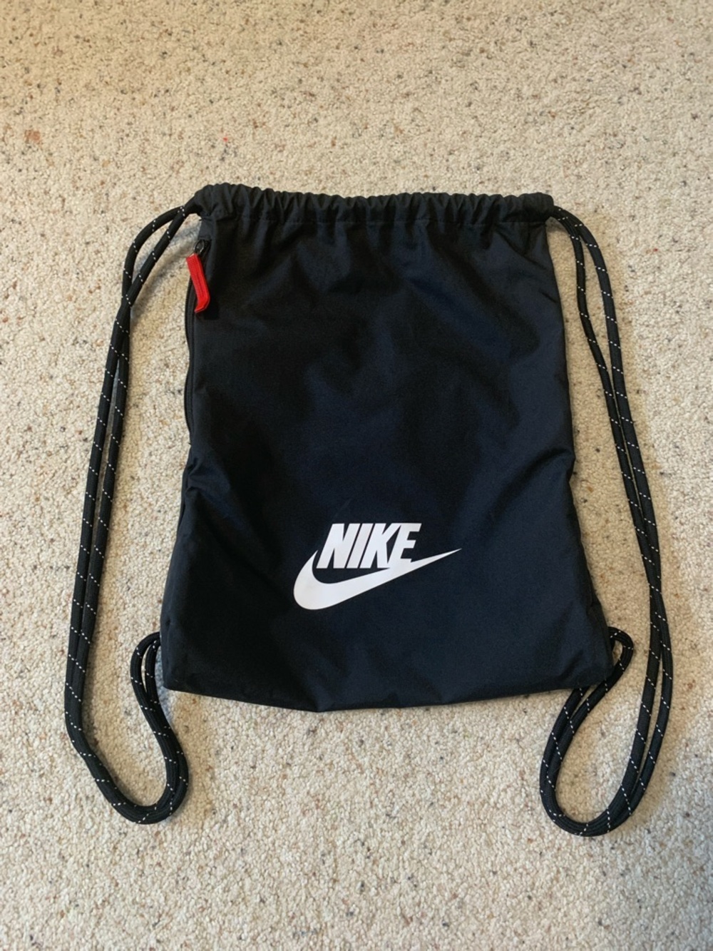 Nike Black Drawstring Sack with White Logo and Red Tab